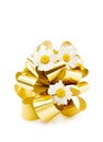 Festive golden bow and pretty flowers