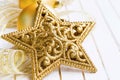 Festive golden glitter star decoration