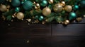 Festive Green and Gold Christmas Decor on Wooden Background Royalty Free Stock Photo