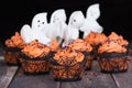 Festive Halloween cupcakes with ghosts