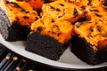 Festive Halloween delicious sweet dark brownie cake decorated wi Royalty Free Stock Photo