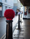 Festive hand knitted bollard decorations in Totnes.  Part of the towns unique Christmas decorations Royalty Free Stock Photo