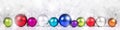 Festive Header with colorful Christmas balls in front of sparkling background Royalty Free Stock Photo
