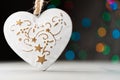 Festive heart shaped decoration ornament with colorful bokeh lights