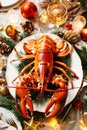 Festive holiday dinner table with lobster and elegant decor Royalty Free Stock Photo