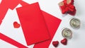 Festive holiday greeting card for Valentines, Birthday, Woman, Mothers Day. Red chocolate hearts, gift box and envelope on white Royalty Free Stock Photo