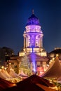 The festive illuminated Deutscher Dome on the Gendarmenmarkt in Berlin, Germany, during winter night time Royalty Free Stock Photo
