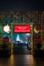 Illuminated entrance adorned with colorful Christmas lights for a cozy and inviting atmosphere