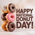 Happy national donut day celebration with a stack of delicious donuts. Royalty Free Stock Photo