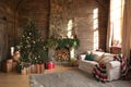 Festive interior with Christmas tree and fireplace Royalty Free Stock Photo