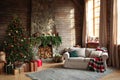 Festive interior with Christmas tree and fireplace