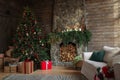 Festive interior with Christmas tree and fireplace Royalty Free Stock Photo