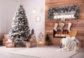 Festive interior with Christmas tree and fireplace Royalty Free Stock Photo