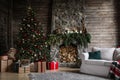 Festive interior with Christmas tree and fireplace Royalty Free Stock Photo