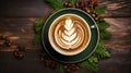 Festive latte coffee with christmas tree foam art, top view on wooden table, holiday background