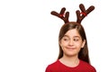 Festive little girl wearing antlers