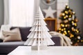 Festive living room with Cozy DIY Christmas decor made from paper Christmas tree. Christmas zero waste
