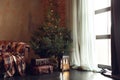Festive living room interior with Christmas tree