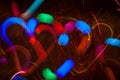 Festive long exposure lights background with hearts. St. Valentine day.