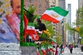 Marching with Iranian flags and flowers. Celebration of annual Persian day Parade in NYC, USA