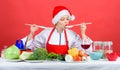 Festive menu concept. Woman chef santa hat cooking hold wooden spoons. Best christmas recipes. Christmas dinner idea Royalty Free Stock Photo