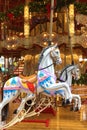 Festive merry-go-round carousel with horses and lights in Frankfurt during the Christmas market, Christmas holiday