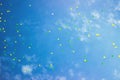 Festive multi-colored balloons in the blue sky Royalty Free Stock Photo