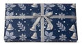 Festive navy blue gift wrap with silver bells and foliage paper Royalty Free Stock Photo