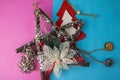 Festive New Year Christmas wooden and metal toy homemade tree and star. Flat lay. Top view. Holiday decorations Royalty Free Stock Photo