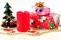 Festive New Year composition with gift boxes, burning candles and New Year`s decor.