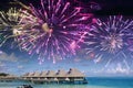 Festive New Years fireworks over the tropical island, mixed media Royalty Free Stock Photo