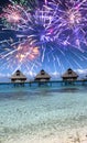 Festive New Years fireworks over the tropical island, mixed media Royalty Free Stock Photo