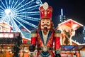 Handcrafted wood Nutcracker toy Christmas Market in Katowice, Poland. Festive nutcracker soldier toys in the evening Royalty Free Stock Photo