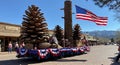 Patriotic parade float featuring huge pine cones Royalty Free Stock Photo