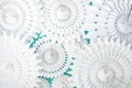 Festive party background with white paper circle fans over blue pastel backdrop