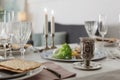 Festive Passover table setting at home. Royalty Free Stock Photo