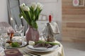 Festive Passover table setting with Torah at home. Royalty Free Stock Photo