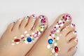 Festive pedicure . Royalty Free Stock Photo