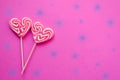 Festive pink background. Sweet heart shaped candies. Love. Valentine`s Day. 14 of February. Flat lay,