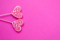 Festive pink background. Sweet heart shaped candies. Love. Valentine`s Day. 14 of February. Flat lay,