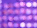 Abstract violet bokeh lights background texture. Royalty Free Stock Photo