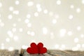 Festive postcard. Two red hearts on a light background. Wedding, birthday, . Royalty Free Stock Photo