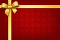 Festive red background with gold ribbon and bow Royalty Free Stock Photo