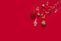 Festive red Christmas and New Year background with wooden musical notes symbols and Christmas decor. Top view, copy space, flat Royalty Free Stock Photo