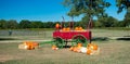 Festive Red Fall Wagon Carrying Pumpkins Ouside a Texas Winery during Halloween Royalty Free Stock Photo
