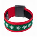 Festive Red and Green Bracelet with White Snowflake Pattern on White Background Royalty Free Stock Photo