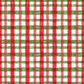 Festive Christmas red and green plaid checkered seamless pattern with white backdrop. Watercolor hand painted stripes and lines.