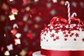 Festive red and white cake with candy cane and star decorations for christmas celebration Royalty Free Stock Photo