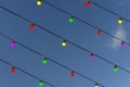 Festive retro garland against the evening sky. Wedding, celebration, event concept.