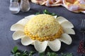 Festive salad Chamomile with eggs, corn and chips on dark background. Close-up Royalty Free Stock Photo